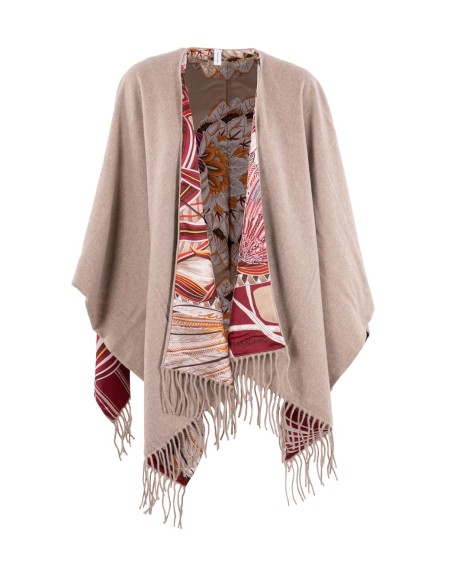 Shop SALVATORE FERRAGAMO  Poncho: Salvatore Ferragamo cappa reversibile in cashmere e seta.
Scollo a scialle e fondo con frange tressé.
Composizione: 95% Cashmere 5% Lana.
Fabbricato in Italia.. 321198-788146